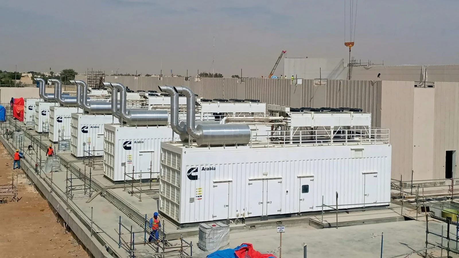 Containerized industrial generators staged for removal